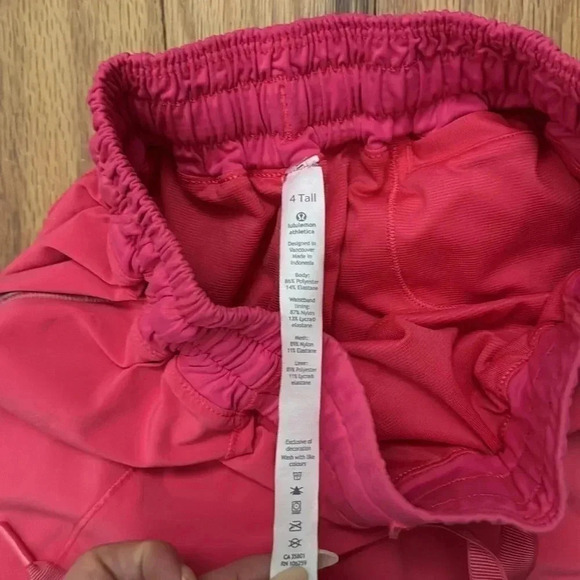 Lululemon Hotty Hot size 4 Tall  short in vibrant coral - Picture 3 of 5